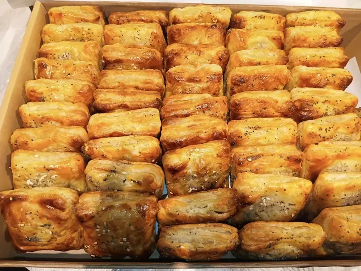 Box of golden baked pastry savouries