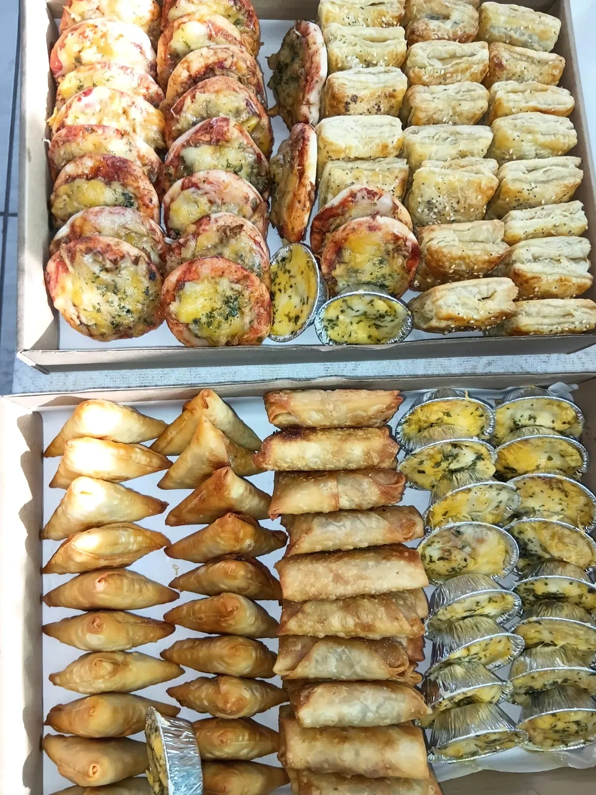 Two boxes of mixed savouries ready for an occasion